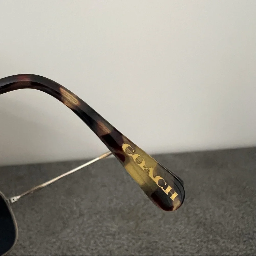 Coach aviator gold